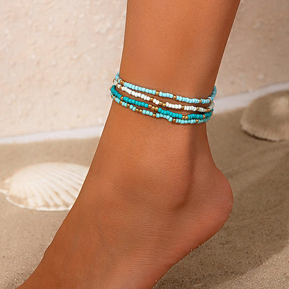 Multi-layered beach conch rice bead anklet